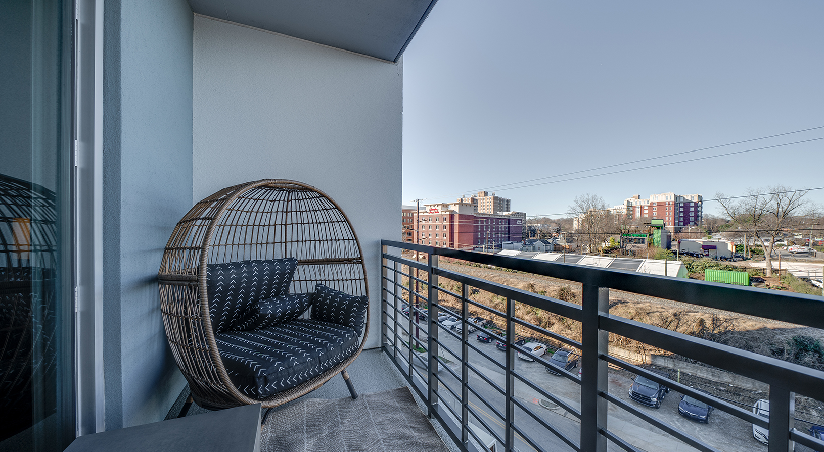 Peace Raleigh Apartments - Balcony with view of the city