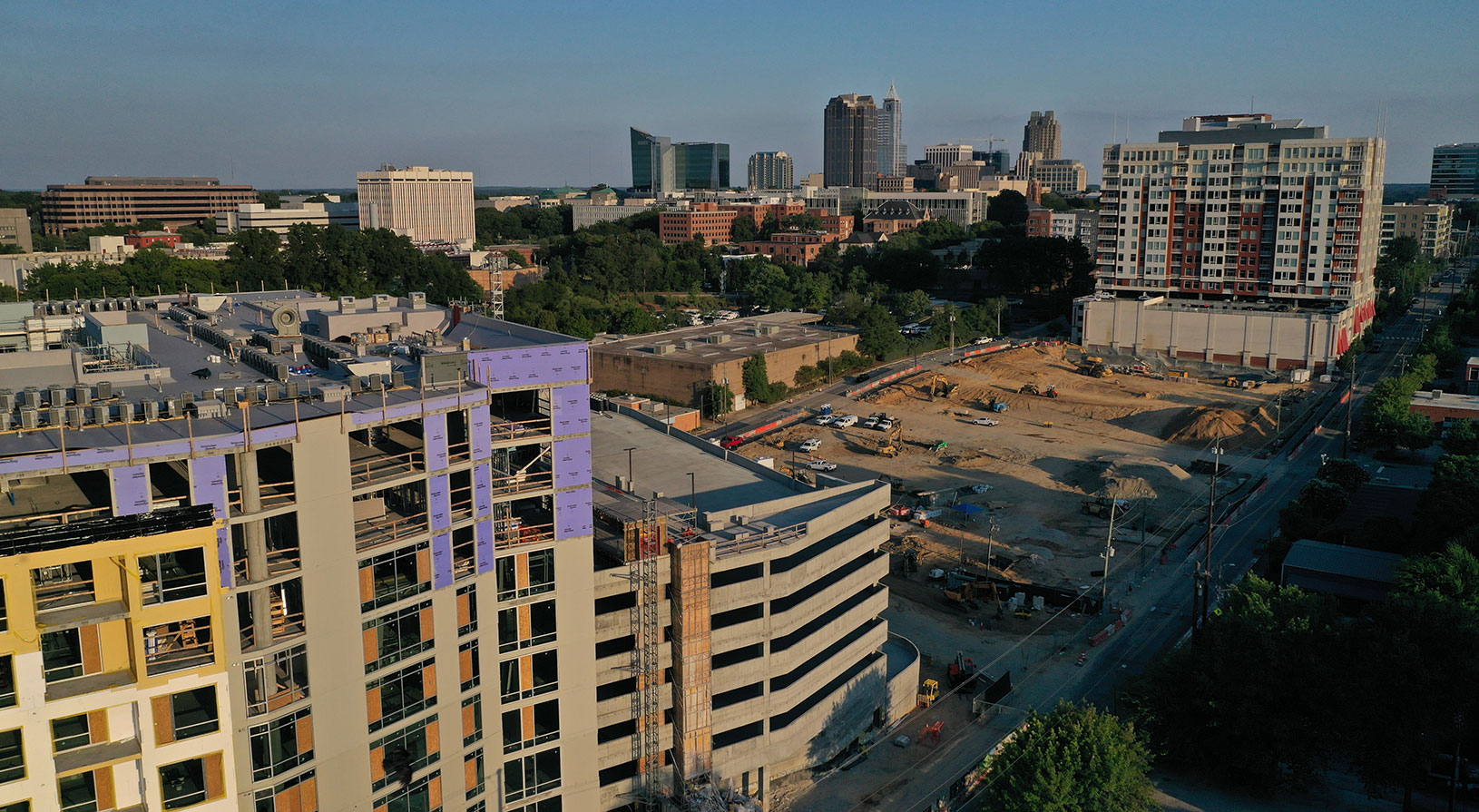 Peace Raleigh Apartments exterior aerial view and city scape