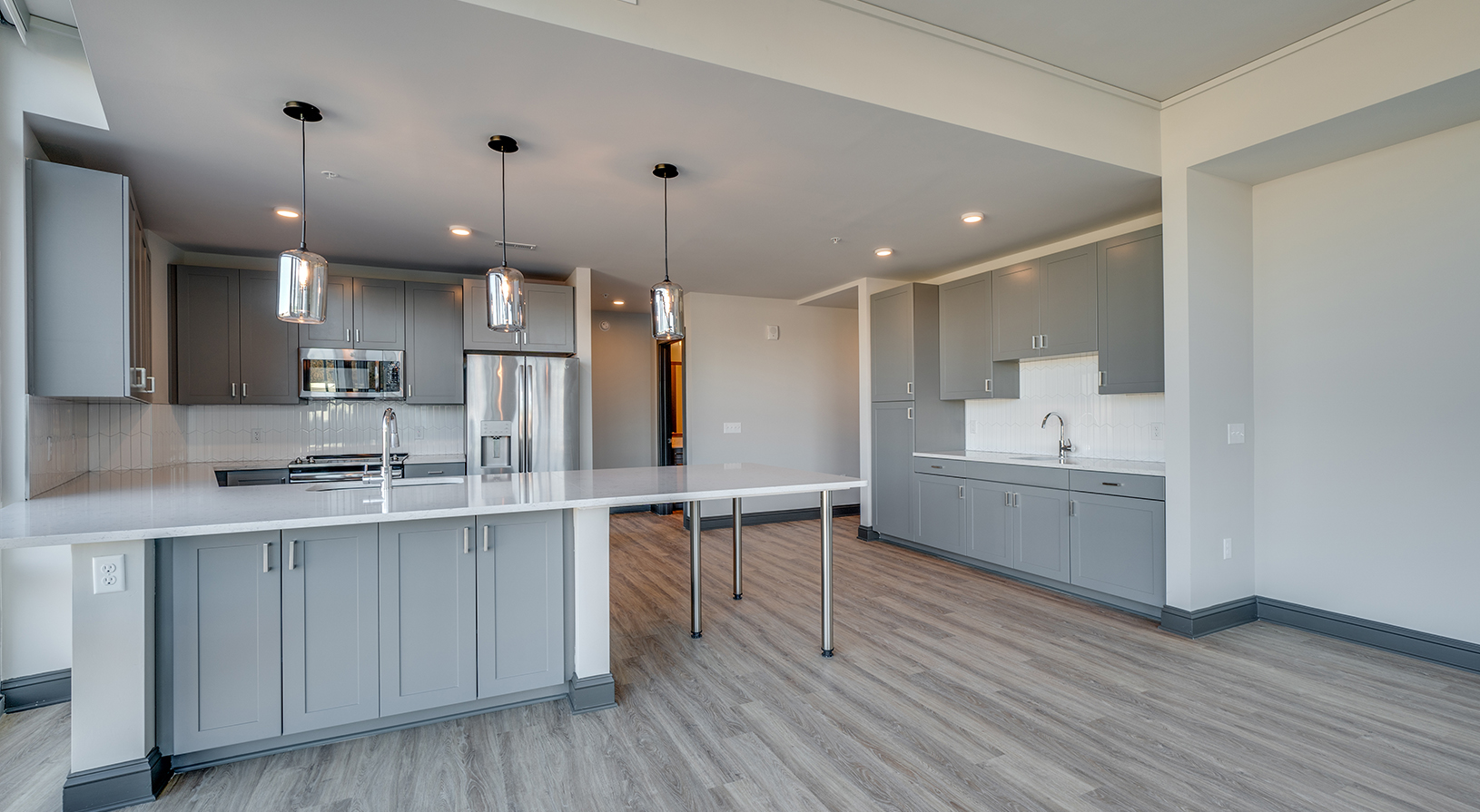 Peace Raleigh Apartments - Chef's Kitchen with two sinks and open floorplan